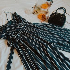 This never worn before navy and white jumpsuit super beautiful and elegant.